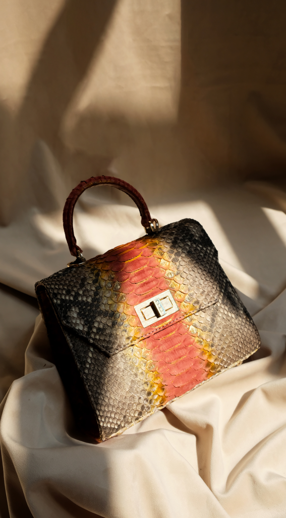Luna boxy structured python leather bag with gold signature KYRA lock and elegant shoulder strap