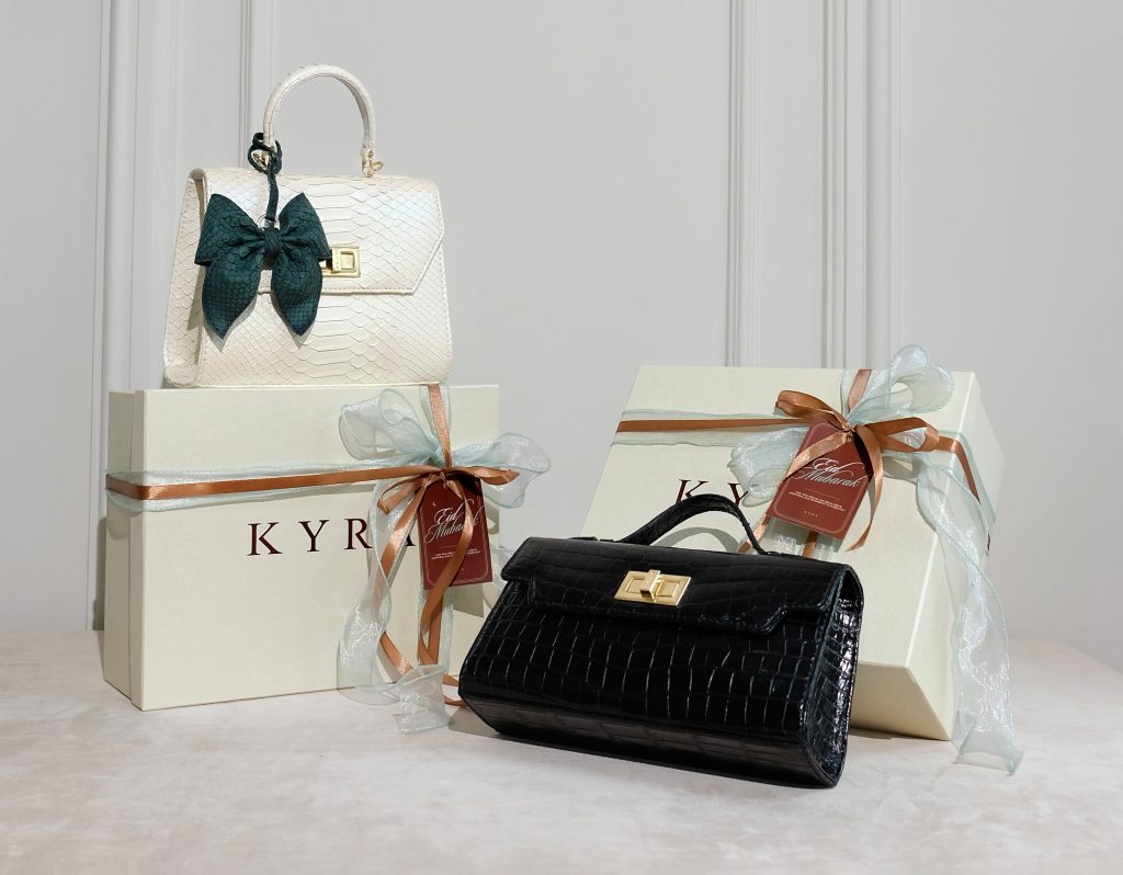 Kyra Collection Eid 2026 luxury hampers featuring Luna Classic Mermaid Pearl and Luna 25 Black Croco exotic leather bags.