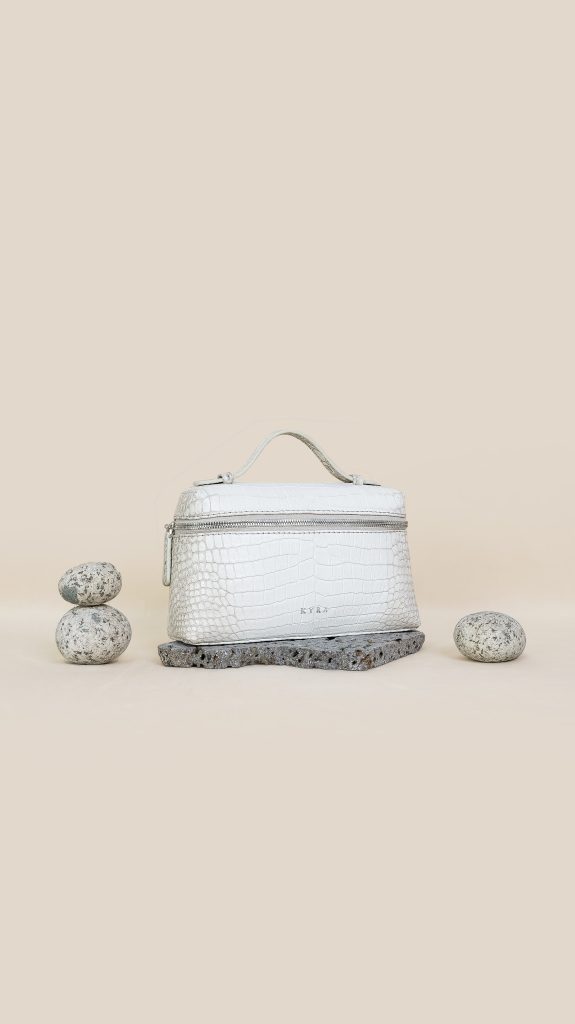 KYRA Picco Croco Himalayan handbag crafted from rare crocodile leather featuring a 3-in-1 multifunctional design with a white and grey gradient for Eid 2026.