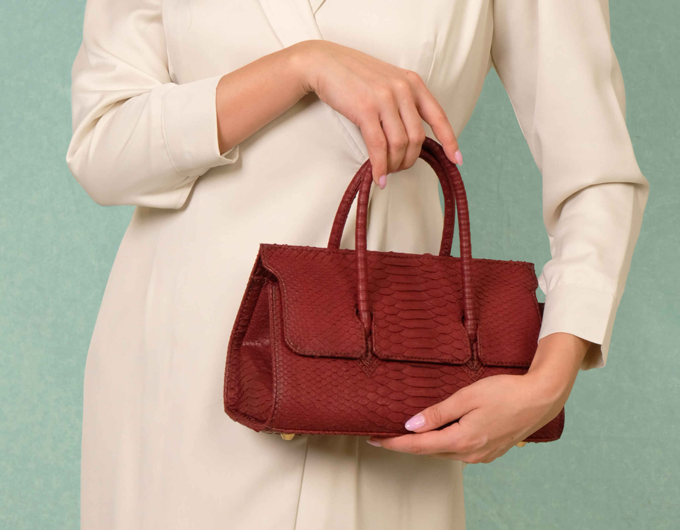 Adriana Lungo genuine python leather handbag with expandable wings and top handle by KYRA