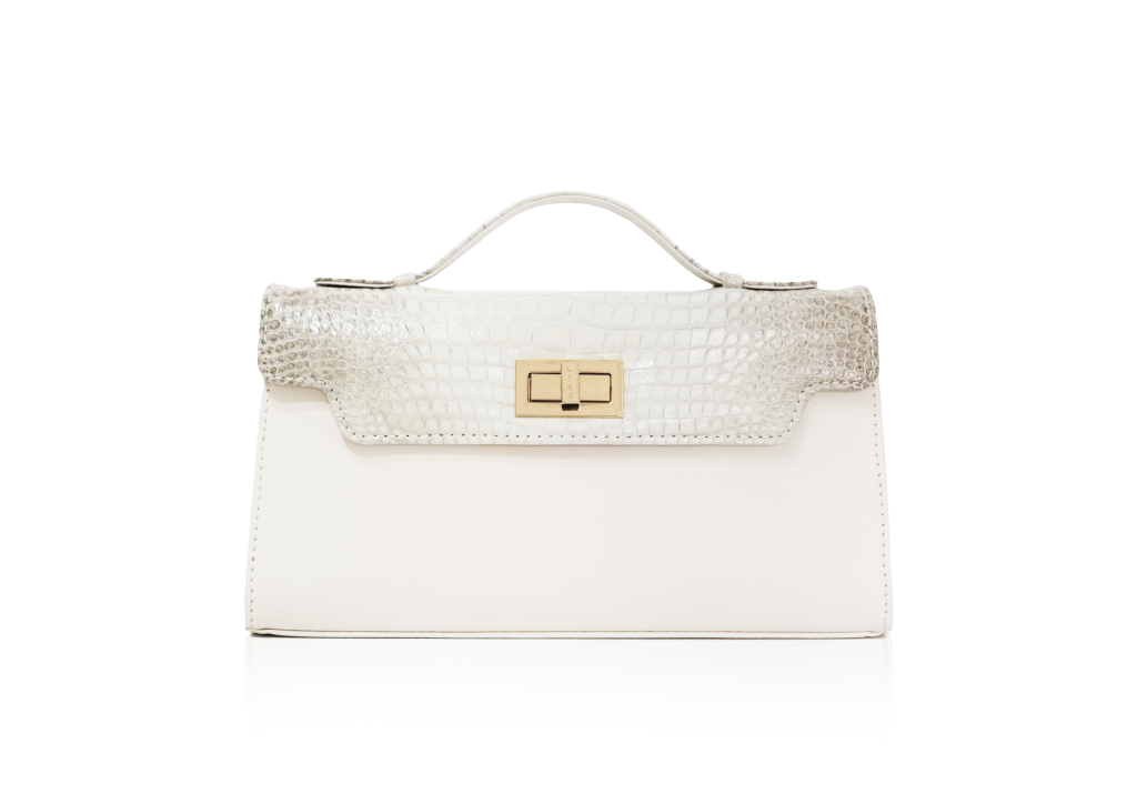 KYRA Luna 29 structured handbag in white calf leather with Himalayan crocodile leather flap and gold turn lock closure a personalized exotic leather bag for Eid Adha 2026.