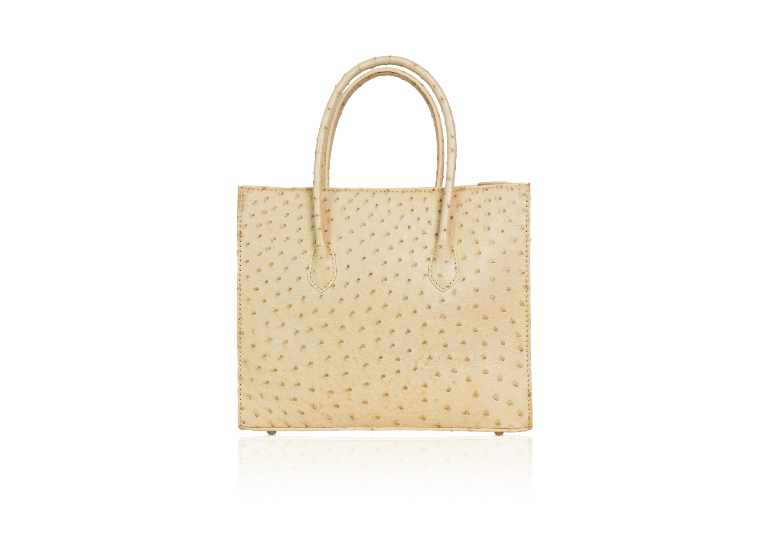 Cream ostrich leather bag with spacious tote design and structured top handles on a white background